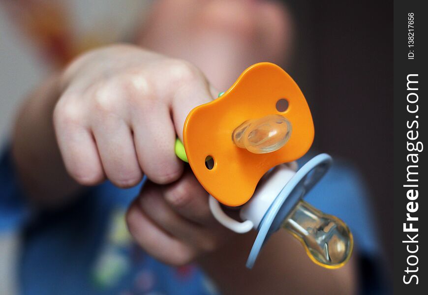 Baby pacifier and baby sleeping, close up. Baby pacifier and baby sleeping, close up