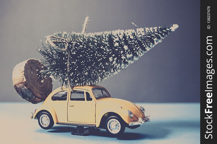 christmas tree on yellow toy car