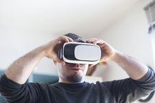 Young Man Using Virtual Reality Headset Stock Photos