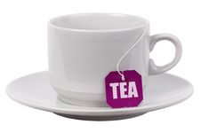 White Tea Cup On A Plate With Tea Label Royalty Free Stock Photo
