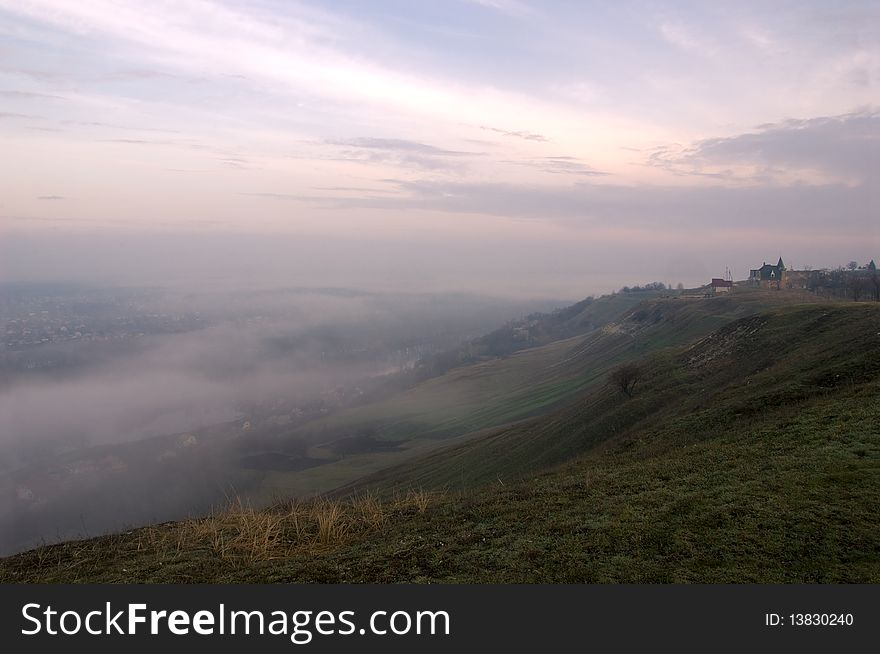 Mysterious fog over a river channel