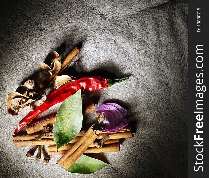 Still Life Of Dried Spices Over Leather