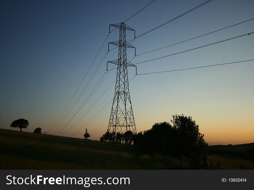 View of a pylon in the sunset and blue skies