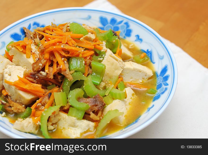 Chinese vegetarian bean curd cuisine. Ingredients include bean curd and mushrooms. Suitable for food and beverage, healthy eating and lifestyle, and diet and nutrition. Chinese vegetarian bean curd cuisine. Ingredients include bean curd and mushrooms. Suitable for food and beverage, healthy eating and lifestyle, and diet and nutrition.