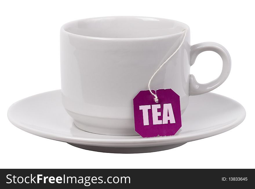 White tea cup on a plate with Tea label