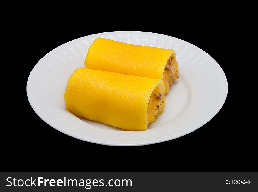 Cake in a plate isolated on the black