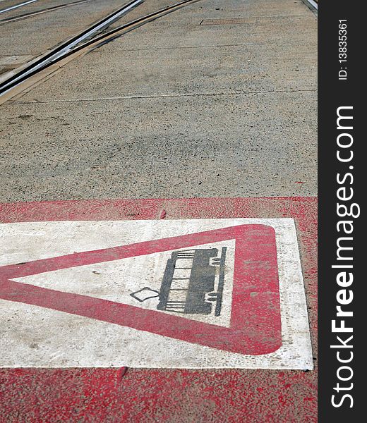 A tram symbol painted across the tram tracks in brussels, belgium