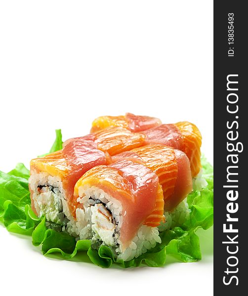 Salmon and Tuna Maki Sushi - Roll made of Cream Cheese and Shrimp (ebi) inside. Fresh Salmon and Tuna outside. Served pn Salad Leaf. Salmon and Tuna Maki Sushi - Roll made of Cream Cheese and Shrimp (ebi) inside. Fresh Salmon and Tuna outside. Served pn Salad Leaf