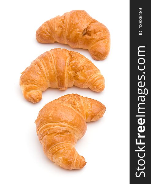 The image of three croissants isolated on white