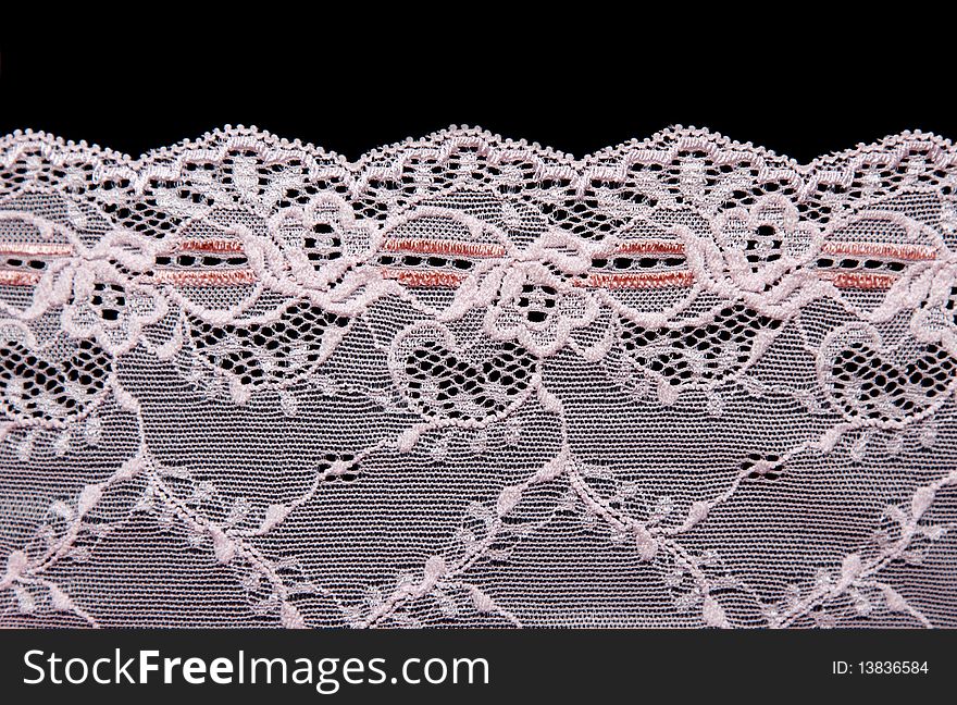 Rose lace with pattern in form flower insulated on black background