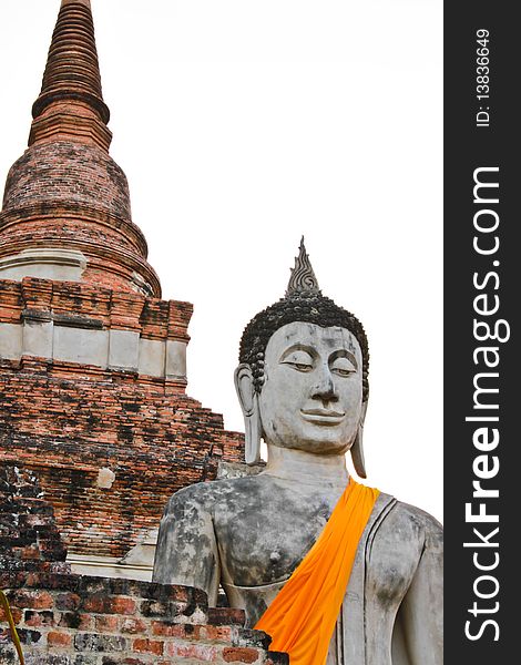 The ancient Buddha statue in front of the pagoda, Ayutthaya, Thailand. The ancient Buddha statue in front of the pagoda, Ayutthaya, Thailand