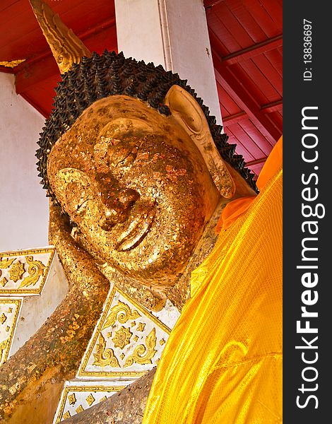 The ancient reclining Buddha statue in the  temple, Ayutthaya, Thailand. The ancient reclining Buddha statue in the  temple, Ayutthaya, Thailand