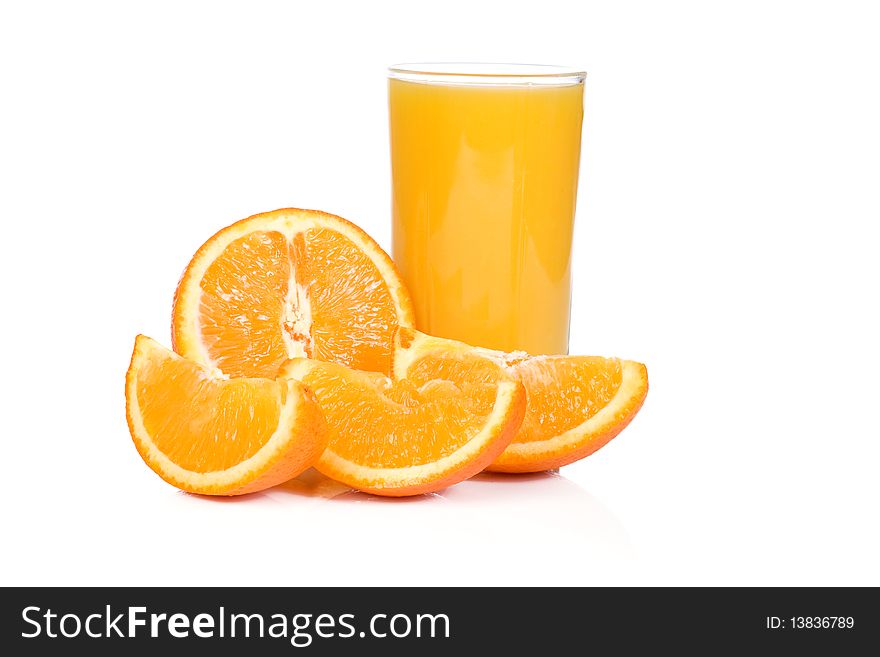 Sliced yellow orange and juice on white
