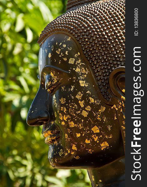 The ancient Buddha statue in front of the pagoda, Ayutthaya, Thailand. The ancient Buddha statue in front of the pagoda, Ayutthaya, Thailand