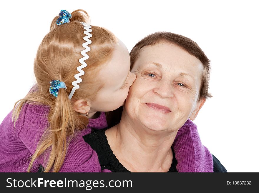 Happy grandma and granddaughter isolated on white. Happy grandma and granddaughter isolated on white