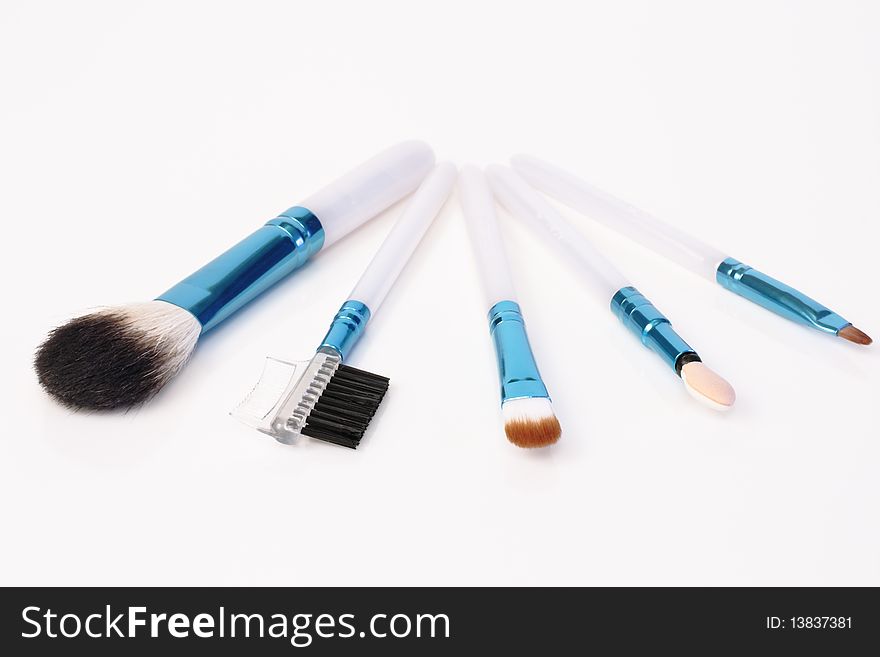Brushes for cosmetics on a white background. Brushes for cosmetics on a white background