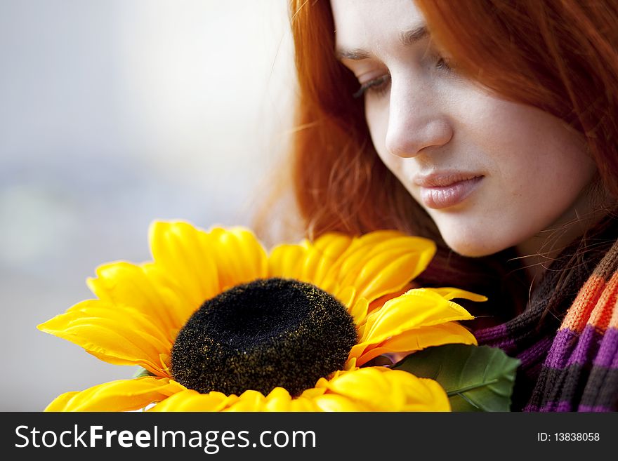 Pretty Girl Walking With A Sunflower City