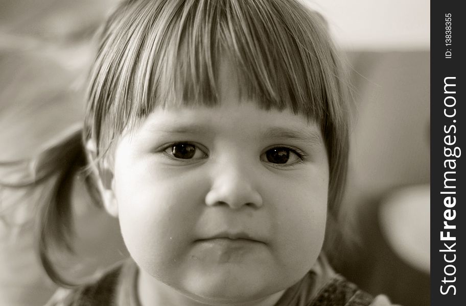 Portrait with beautiful girl with a wondering look