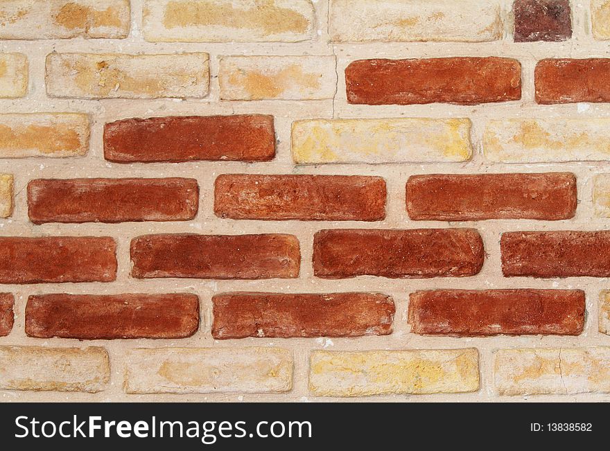 Interior white and red brick wall