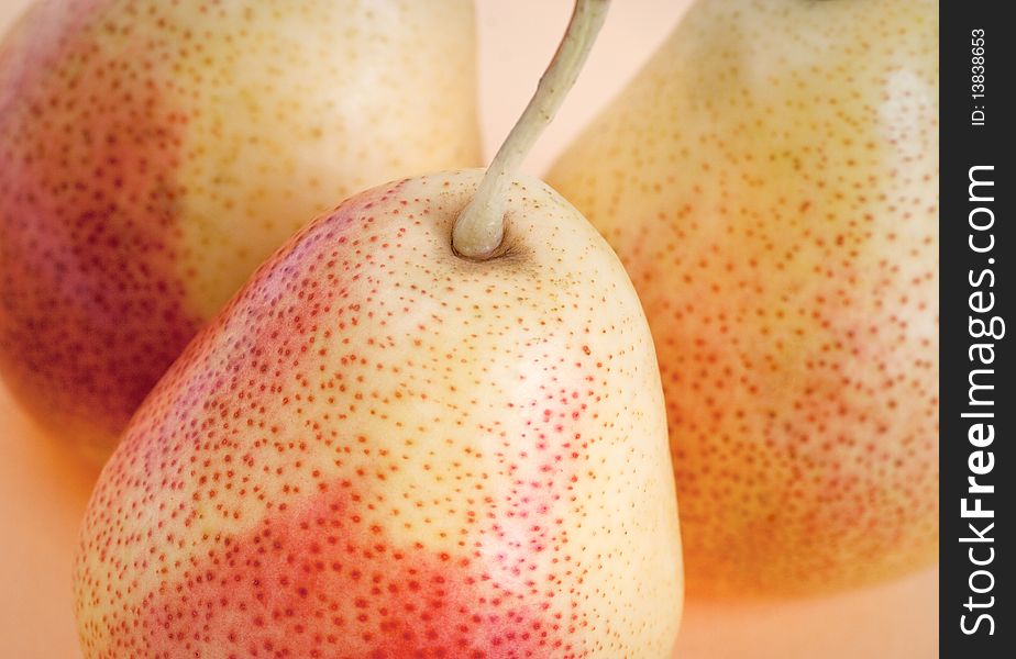 Three ripe tasty pears. Selective focus. Three ripe tasty pears. Selective focus.