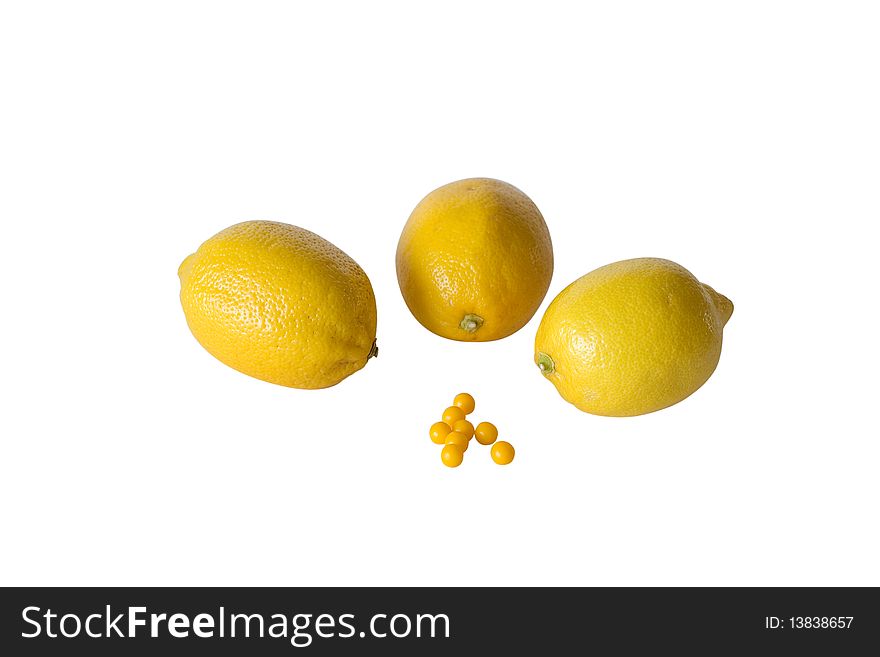 Lemons and vitamins on white background isolated. Lemons and vitamins on white background isolated