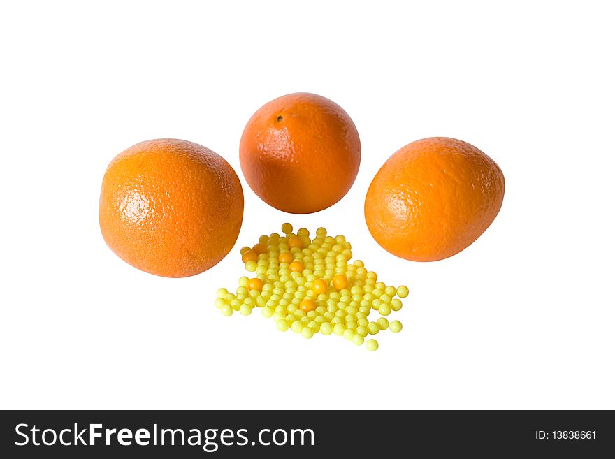 Oranges and vitamins on white background isolated