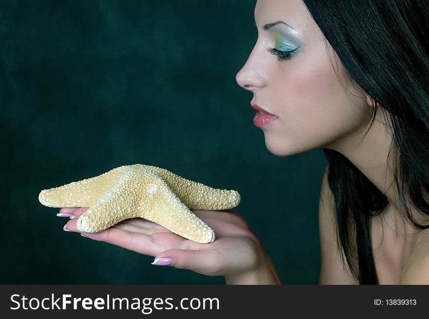 Girl In Profile With Starfish
