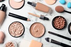 Flat Lay Composition With Skin Foundation, Powder And Beauty Accessories Royalty Free Stock Image
