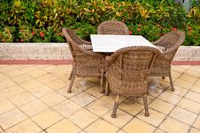 Brown Wooden Chairs An Tables On Patio Stock Photos