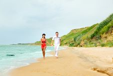 Running Along The Beach Stock Photos Running Along The Beach Stock Photos
