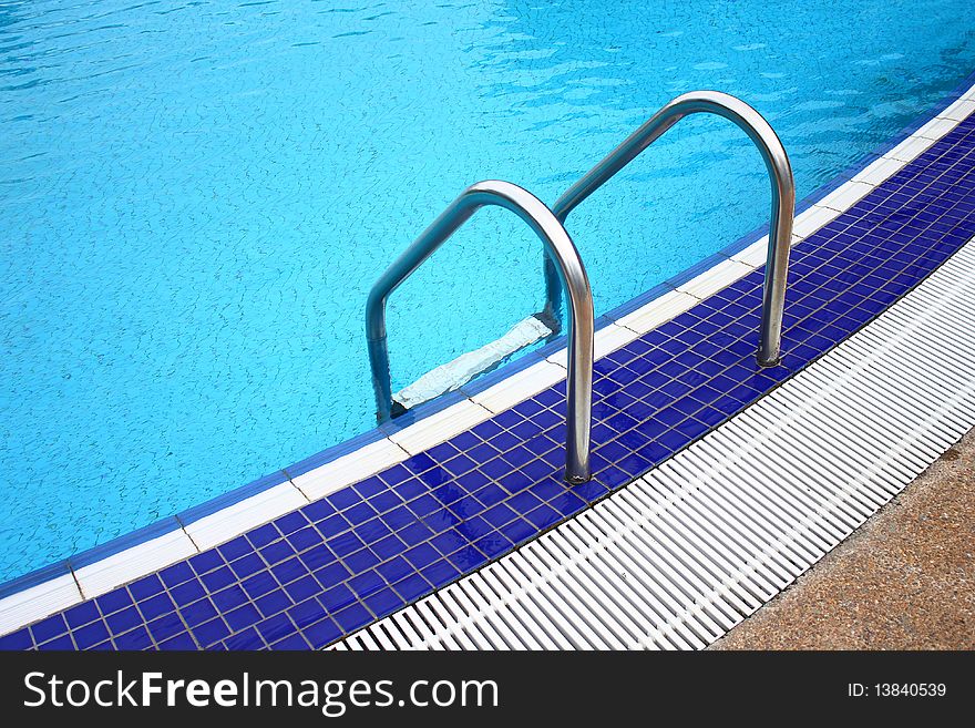 Luxury hotel poolside and ladder