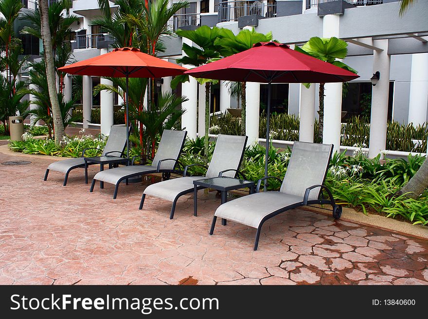 Poolside Deckchair At Luxury Hotel