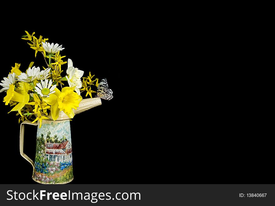 Spring flowers with butterfly on handpainted oil can. Spring flowers with butterfly on handpainted oil can.