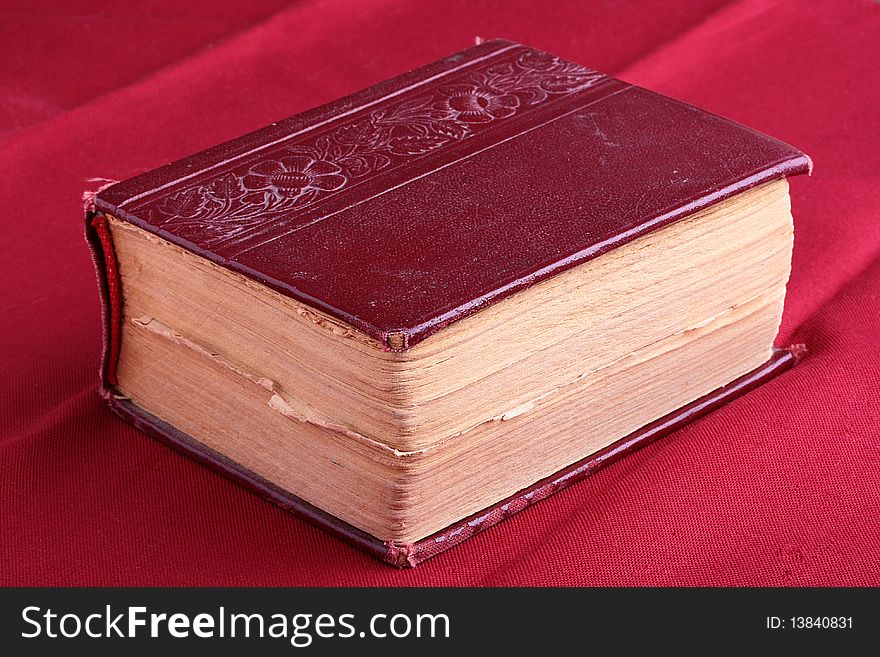 The ancient bible on a wooden table.