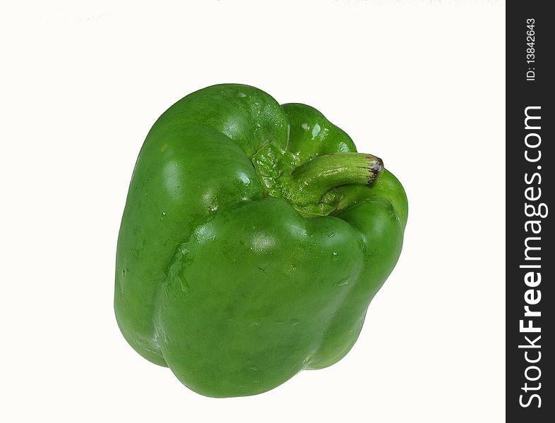 Raw Green Pepper On The Table