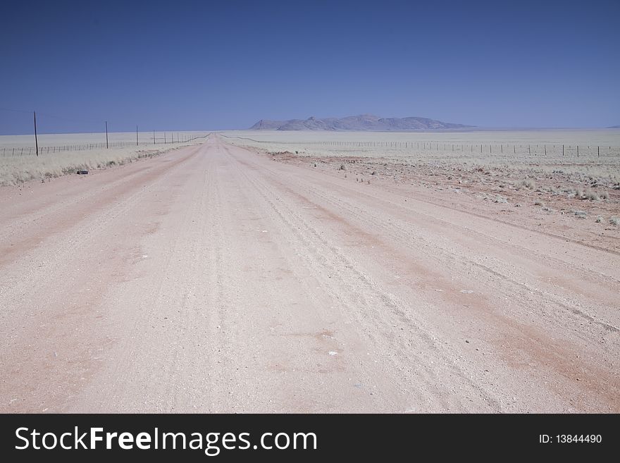 Image of a gravel road in the Namibian Desert Africa. Image of a gravel road in the Namibian Desert Africa