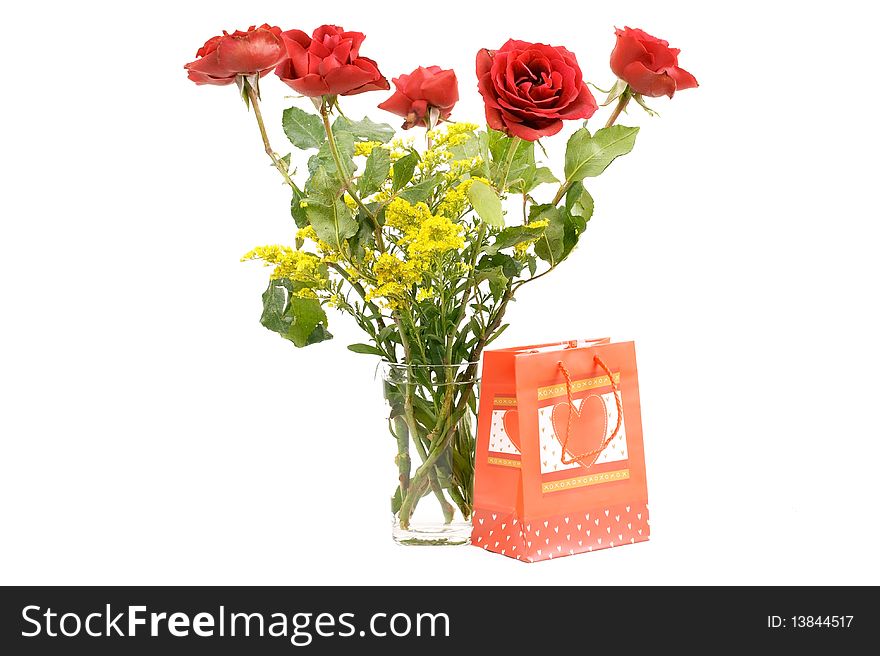 Bouquet of roses with present
