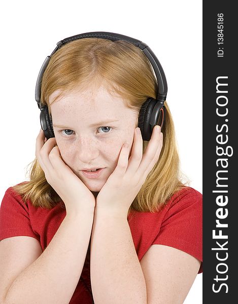 Girl is listening to music isolated on a white background. Girl is listening to music isolated on a white background