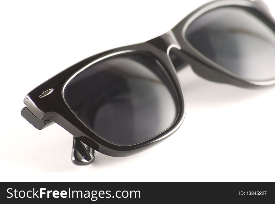 Trendy black sun glasses on a white background