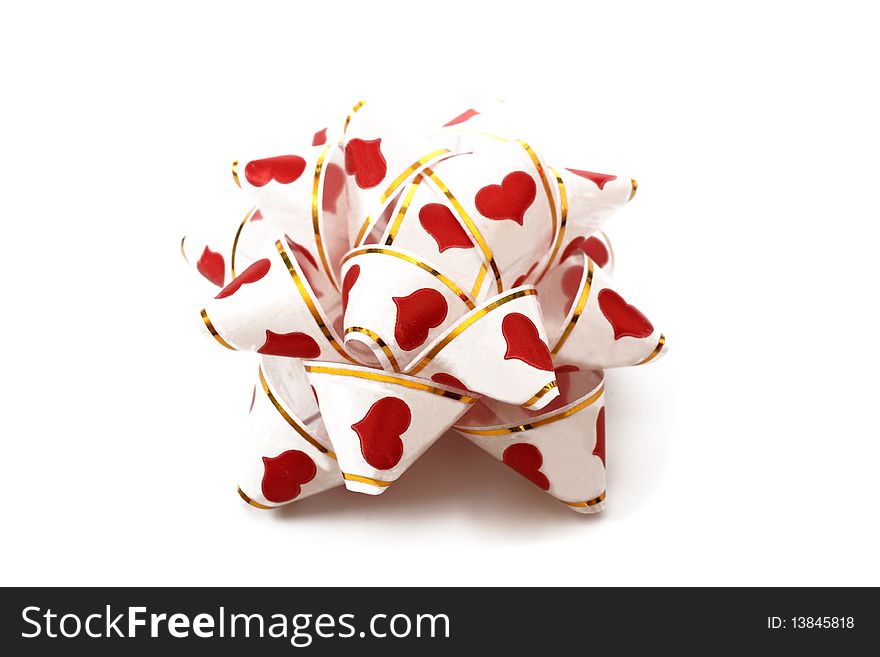 White ribbon with red hearts for the gift boxes