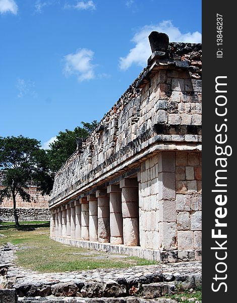 Detail of mexican maya public building with courtyard, portico and columns in Uxmal, Yucatan. Detail of mexican maya public building with courtyard, portico and columns in Uxmal, Yucatan