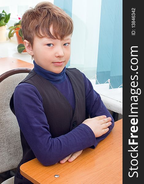 The Pupil Sits At A School Desk