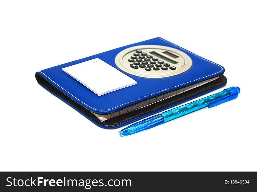 Photo of the note pad with pen on white background