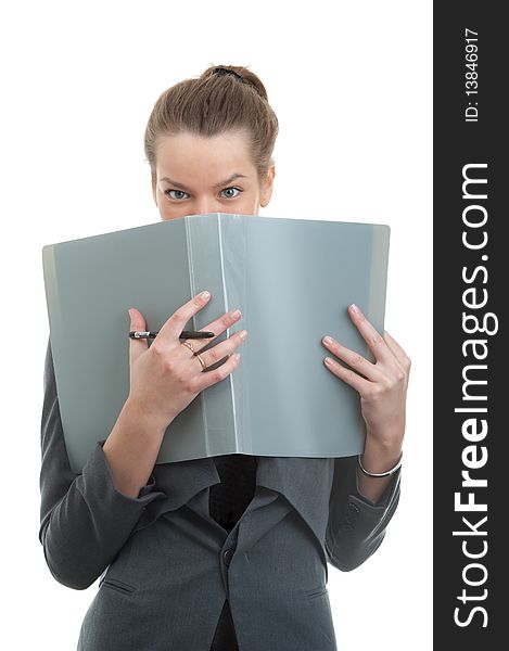 Portrait of a young businesswoman holding a folder isolated over white