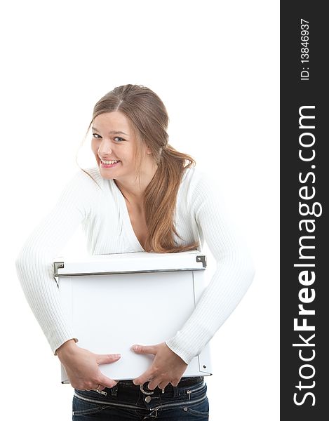 Portrait of a smiling girl holding white box over white background