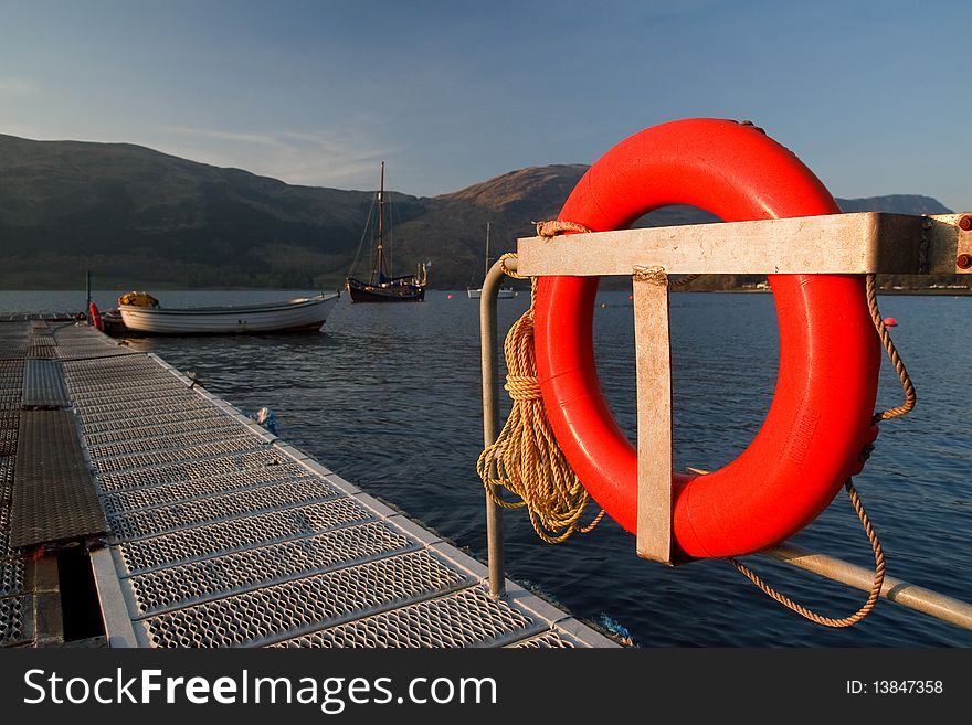 A pier in one of Scottish mountain towns. A pier in one of Scottish mountain towns.