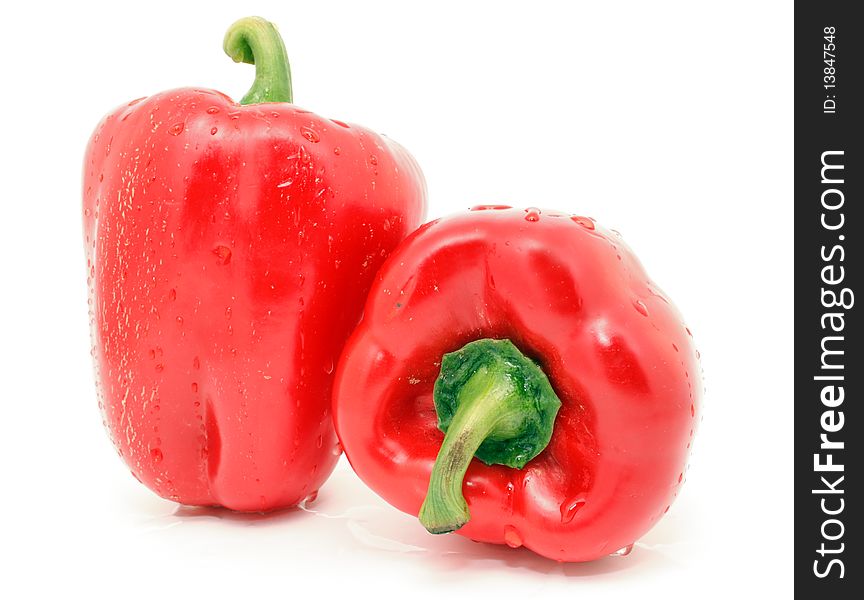 Fresh red bell peppers isolated on white. Fresh red bell peppers isolated on white