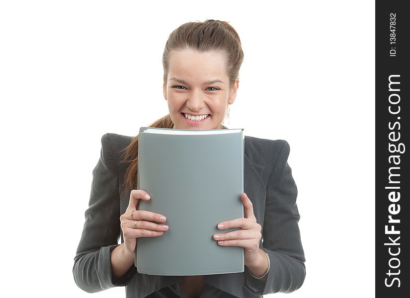 Portrait of a young businesswoman holding a folder isolated over white