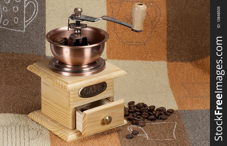 Coffee grinder on a kitchen towel