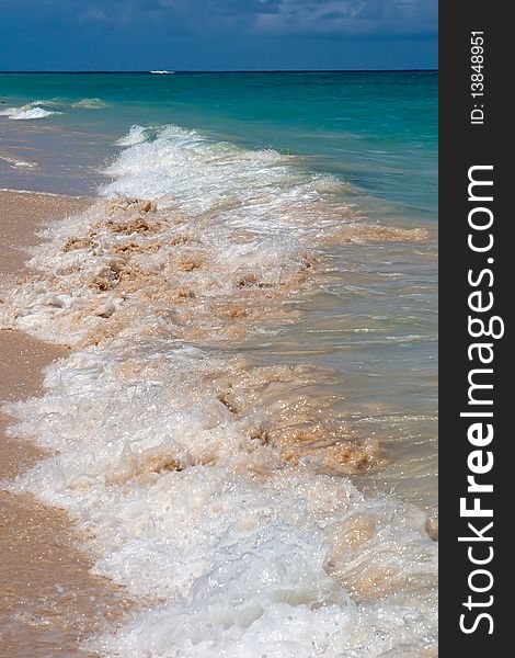 White sand beach blue ocean and sky